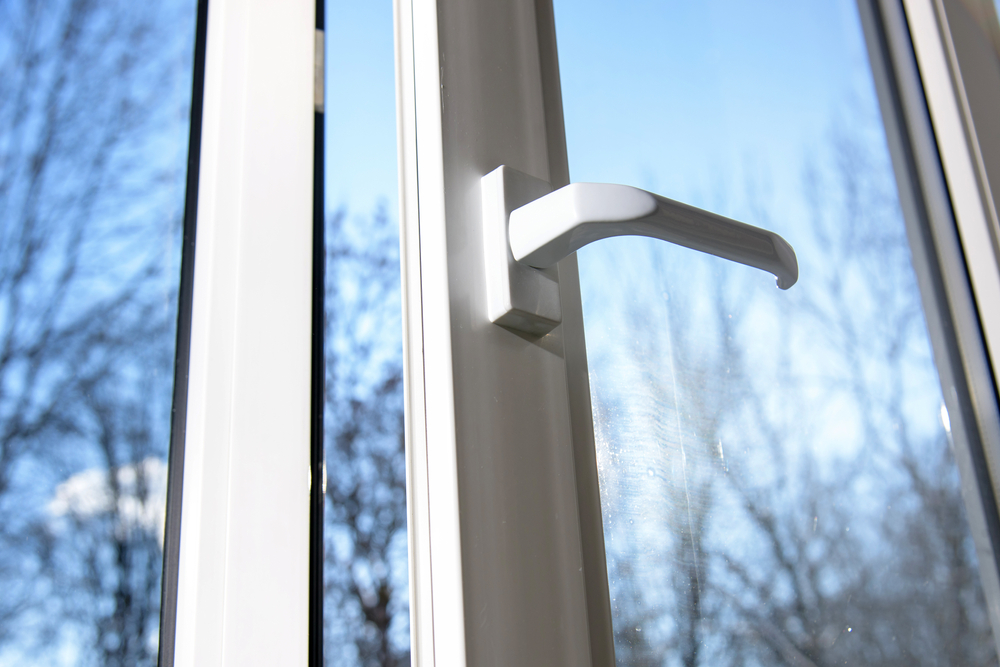Opened,vinyl,plastic,window,on,blue,sky,winter,background